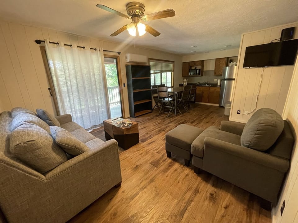 Relax in style: a cozy, modern living room perfect for unwinding after a day of adventure