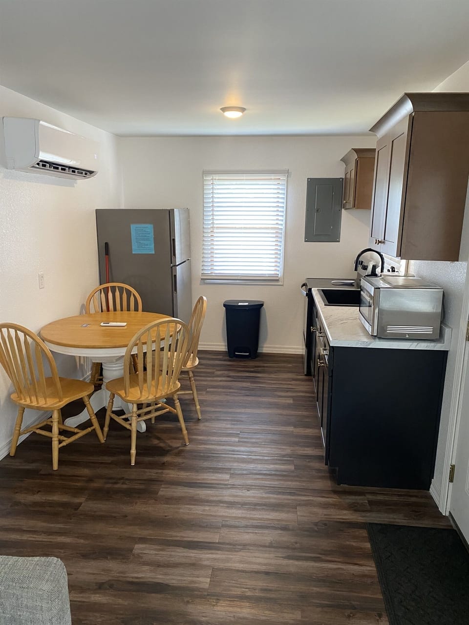 Where gourmet meals meet modern elegance   a kitchen and dining space designed for both cooking and sharing memories