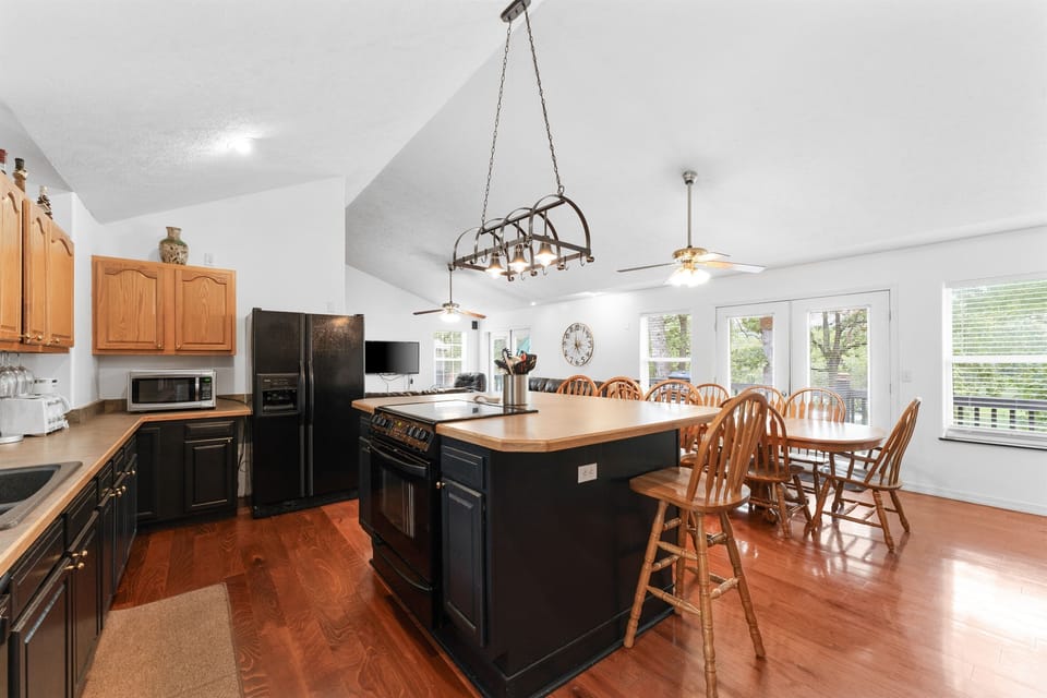 Where comfort blends with style a modern kitchen featuring the perfect breakfast island