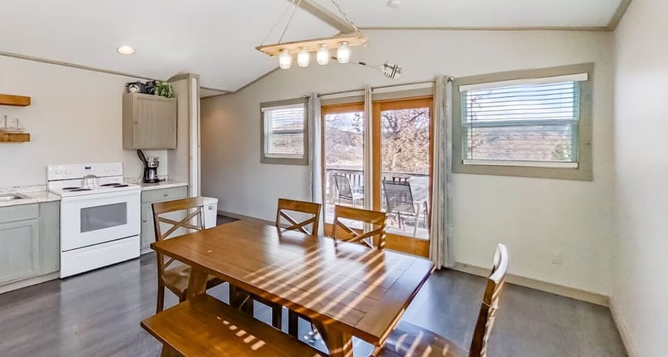 Cozy vibes in the charming kitchen, dining space.