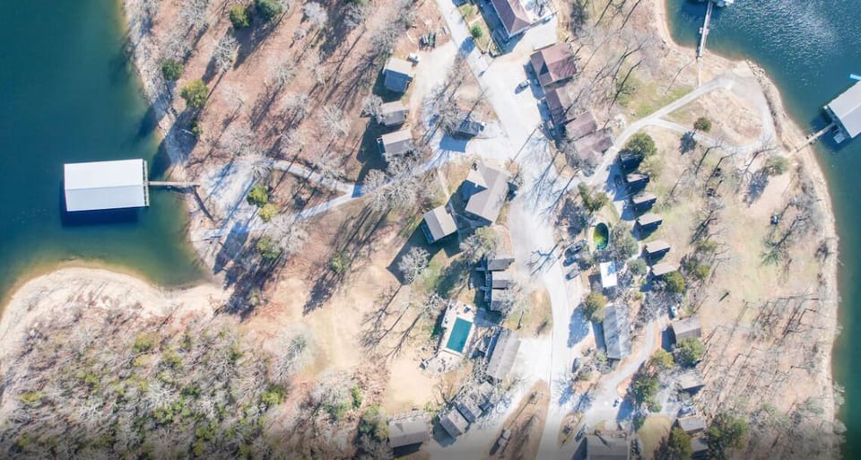 Bird's eye view of your serene cabin getaway surrounded by nature's beauty