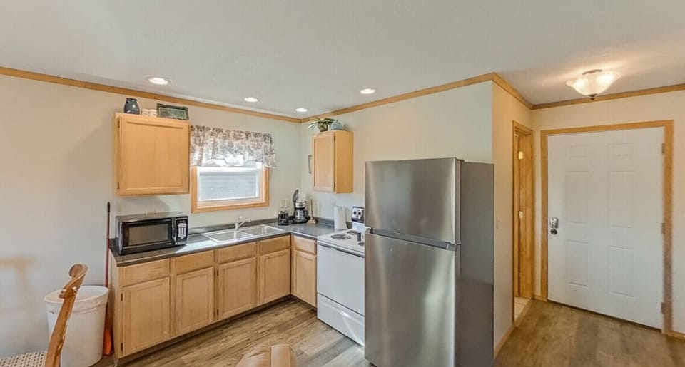 Where gourmet meals meet a kitchen and dining space designed for both cooking and sharing memories