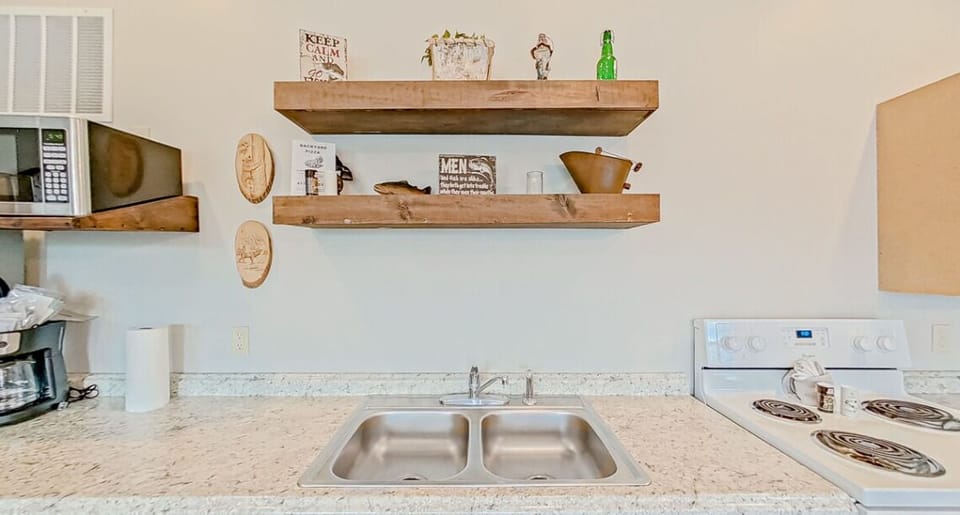 Charming and efficient this small kitchen and dining area makes every moment feel intimate and delicious