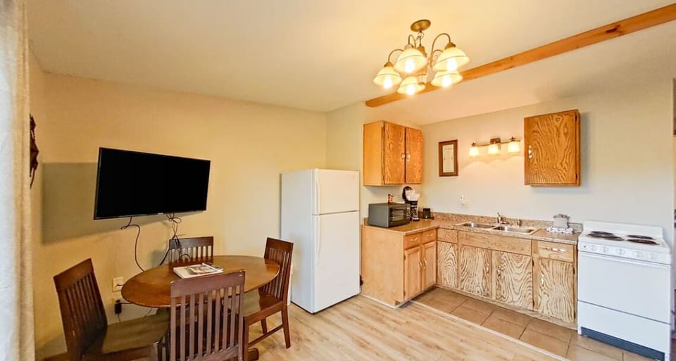 Where gourmet meals meet a kitchen and dining space designed for both cooking and sharing memories
