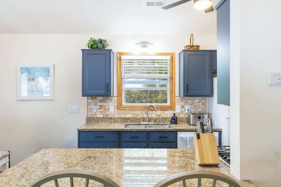 Fully Stocked Kitchen with Breakfast Bar