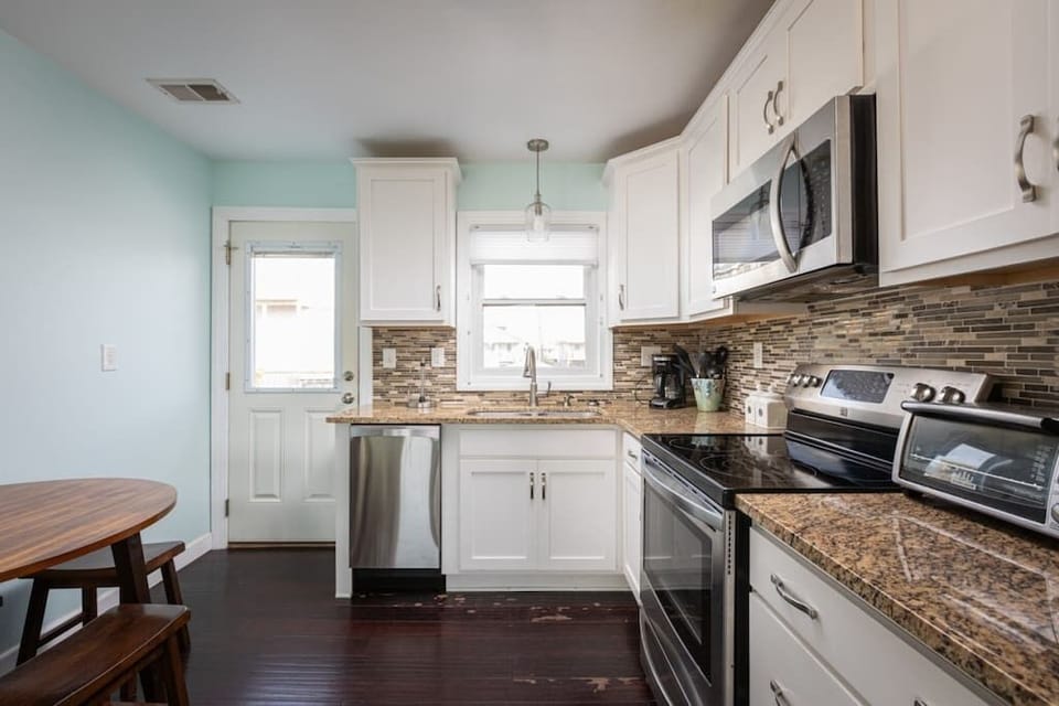 Fully Stocked Kitchen w/ Refrigerator, Oven, Microwave, Toaster, Cooking Utensils, and Pots n Pans