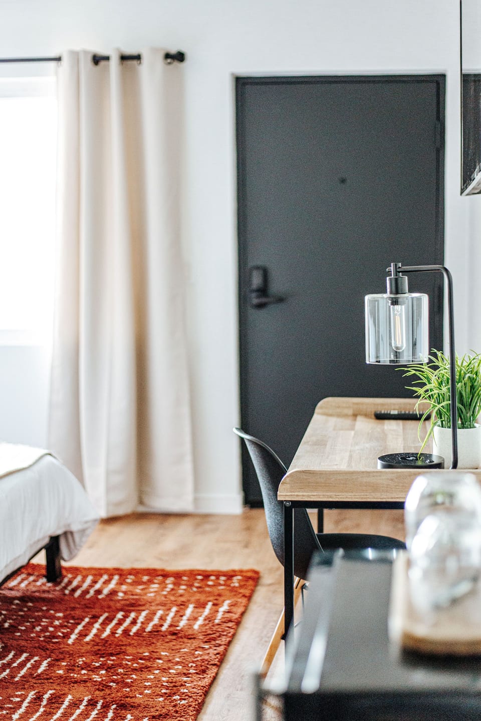 Premium bedding, memory foam beds, desk, laptop workspace