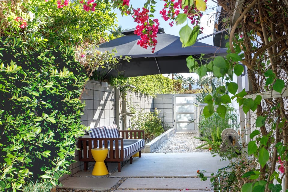 The gorgeous bougainvillea archway w/canopy for shade
