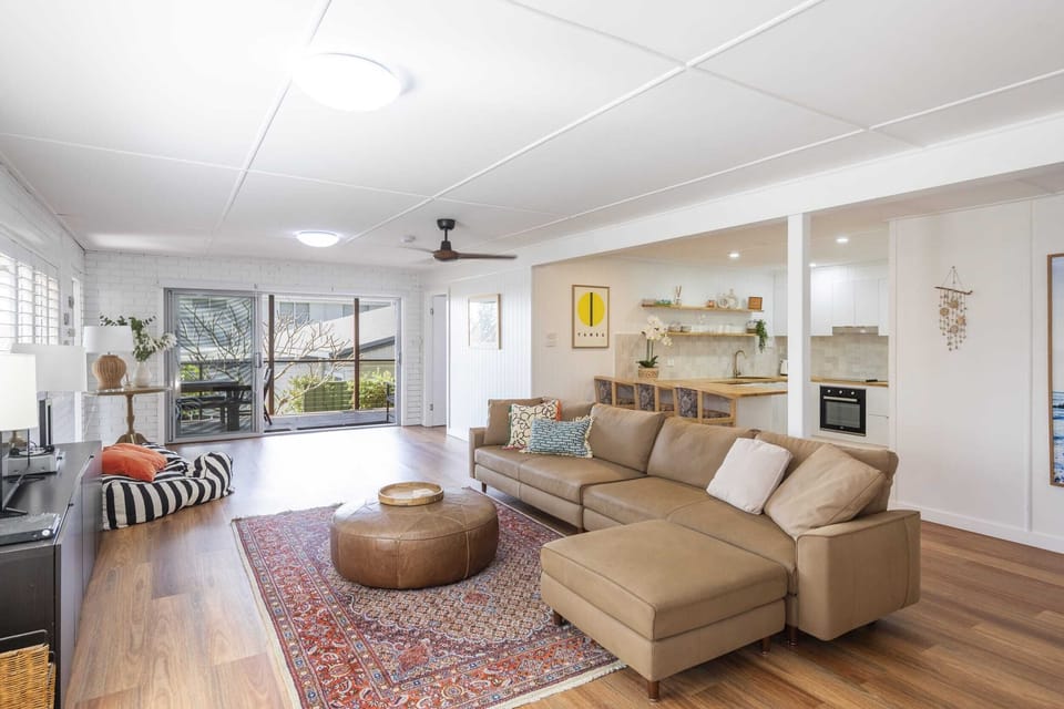 Bimbajong Studio - Yamba coastal accommodation -  Open plan kitchen living & dining - Spacious living area with ample seating