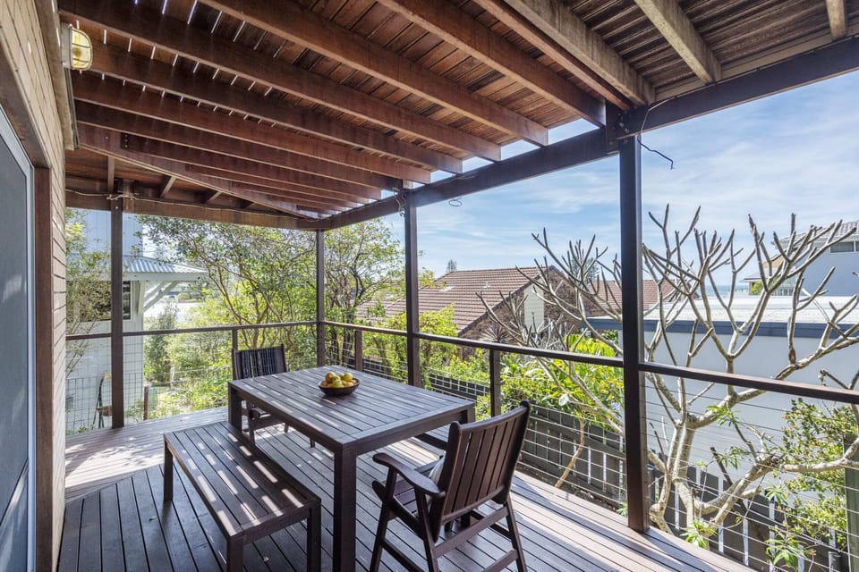 Bimbajong Studio - Yamba coastal accommodation - Rear balcony with ocean views & ample seating