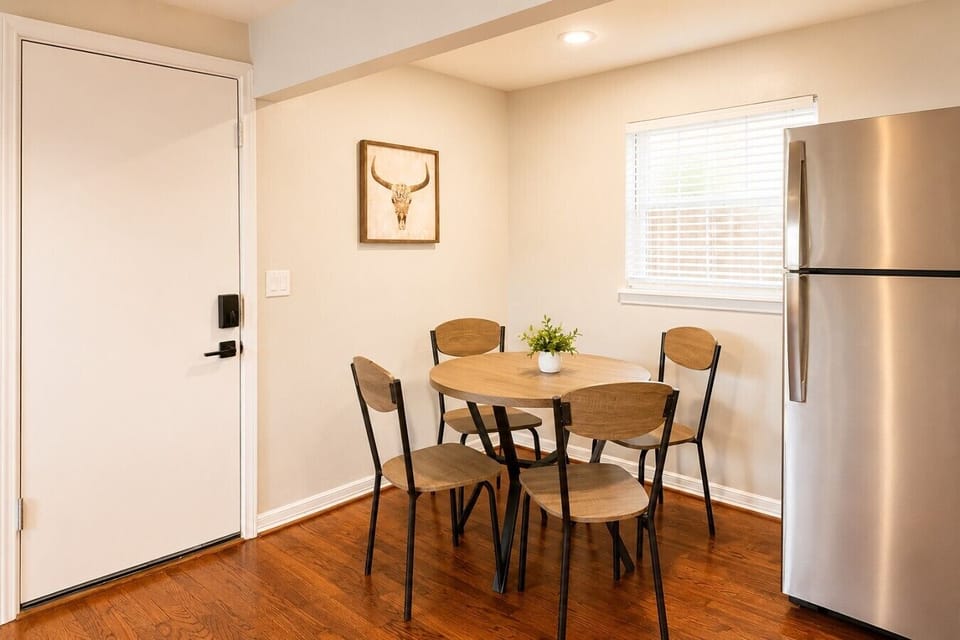 Cozy dining area with seating for four, perfect for casual meals or morning coffee.