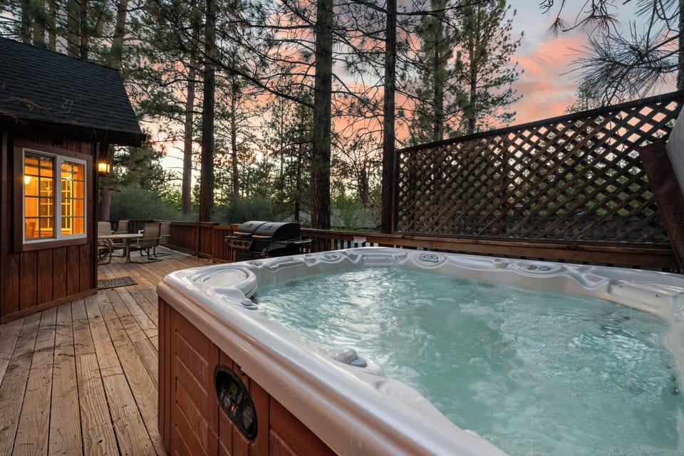 Private Hot Tub on back patio - Private Hot Tub on back patio with dining area and views of trees