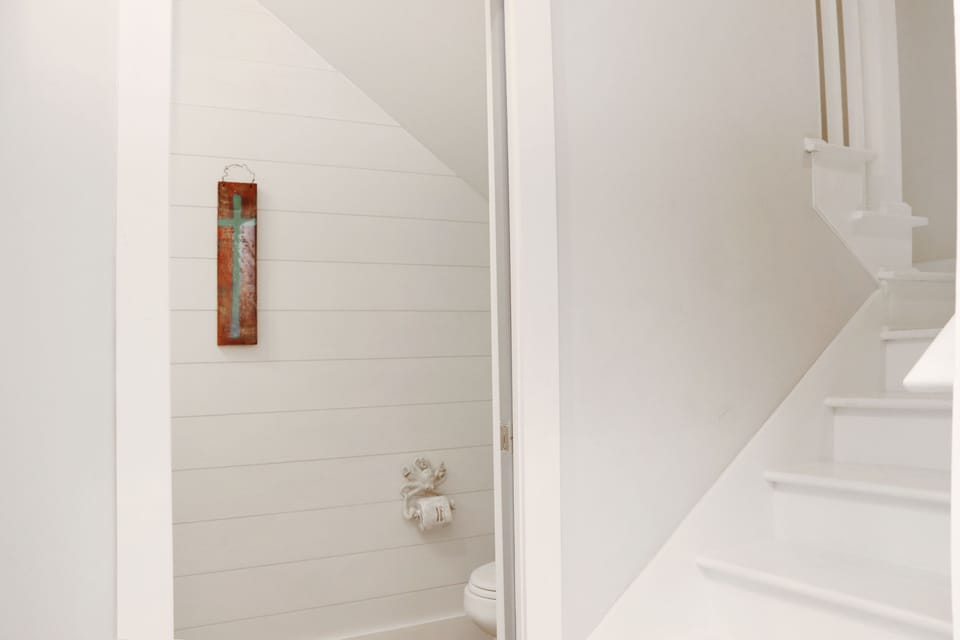 Half Bath with Stairs to Second Floor