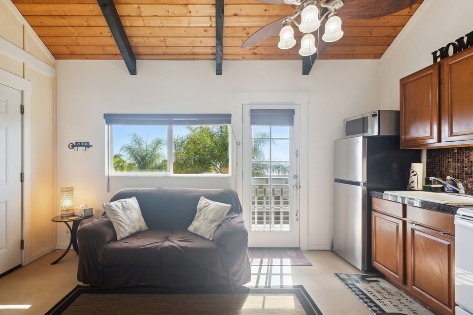 Indoors, Refrigerator, Couch, Furniture, Ceiling Fan