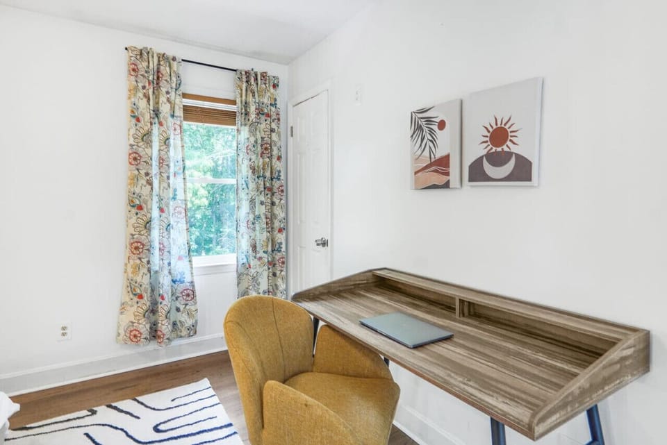 Unwind in the cozy game room, complete with comfortable seating and a giant Connect Four game for endless fun.
