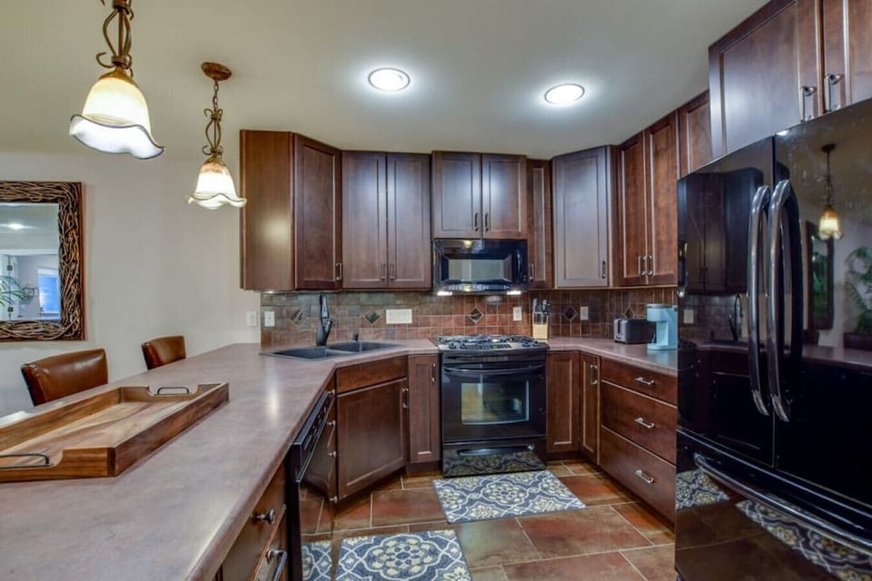 Enjoy all the appliances and amenities the fully-stocked kitchen offers.