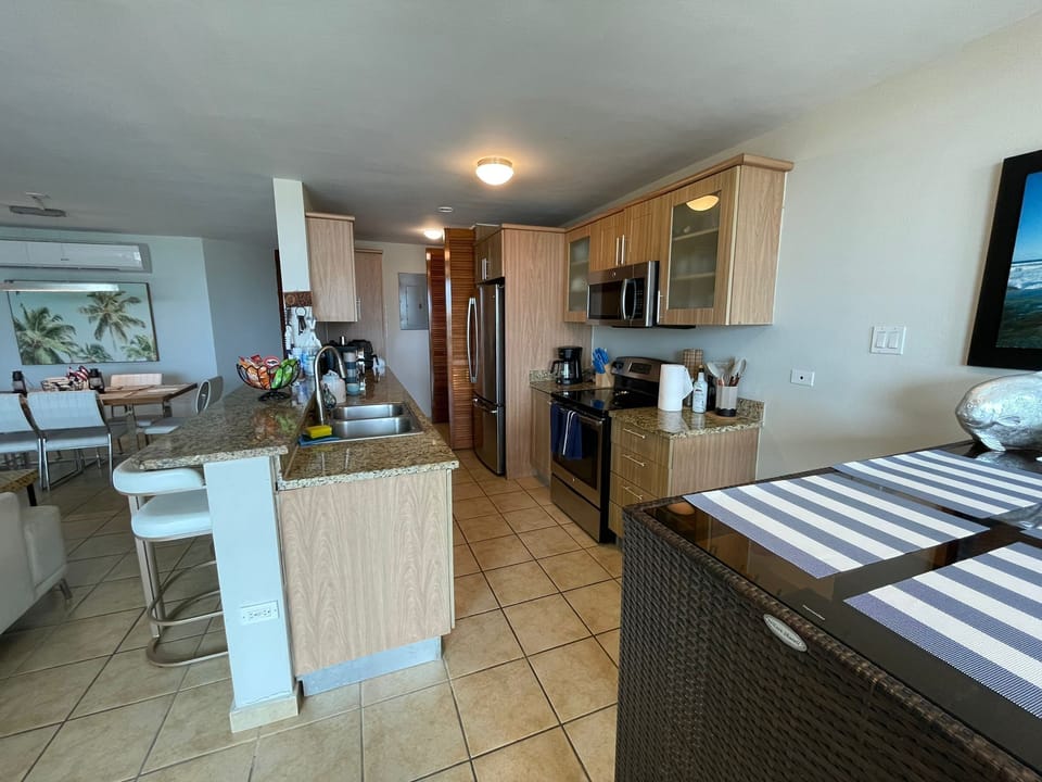 Apartment, 3 Bedrooms, Ocean View | Private kitchen | Full-size fridge, microwave, oven, stovetop