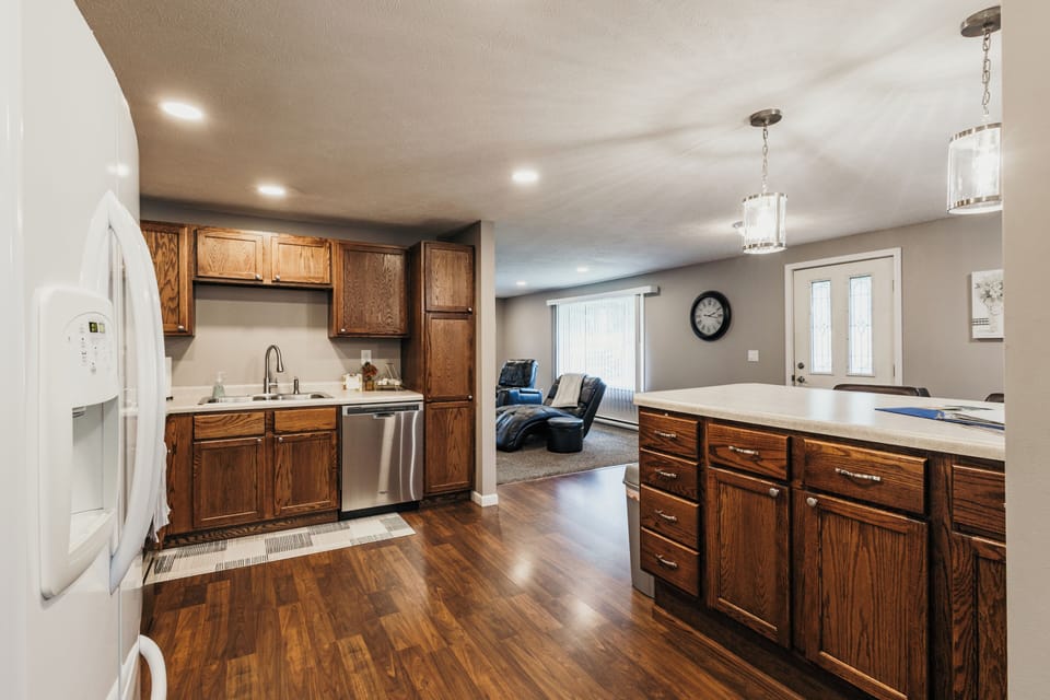 Updated & stocked with standard kitchen & cooking supplies. Seating for 6.