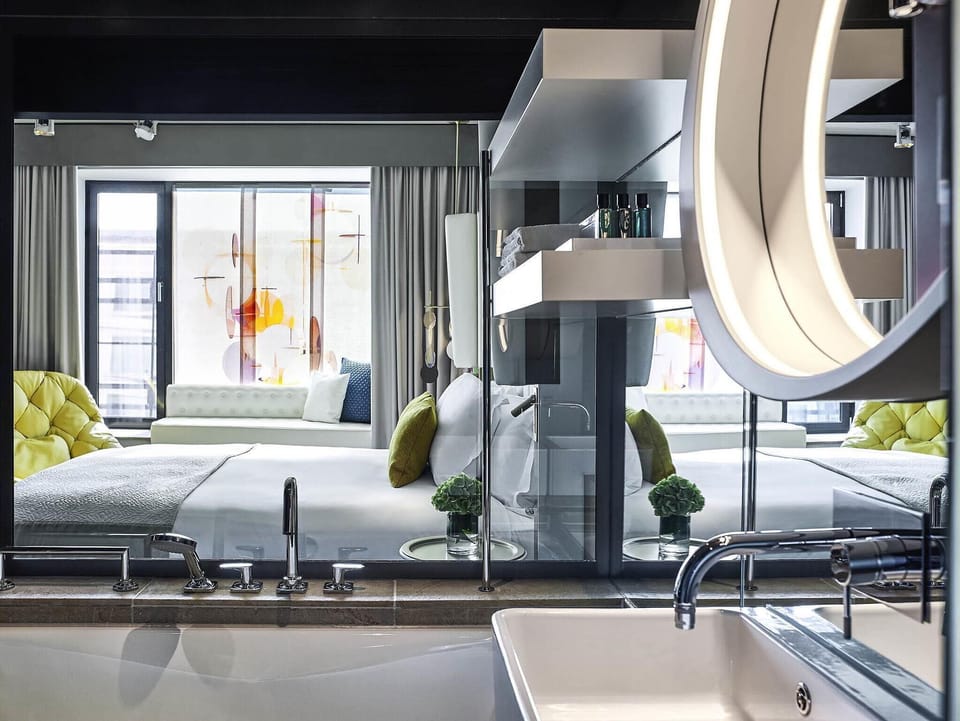 Premium bedding, down comforters, pillowtop beds, minibar