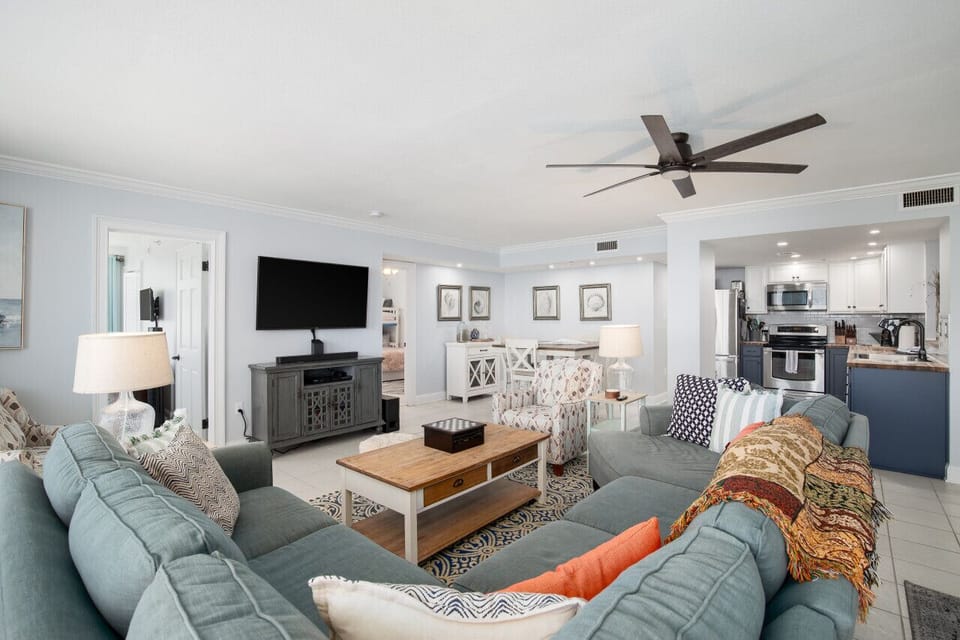 Open living with easy access to the kitchen and dining areas.