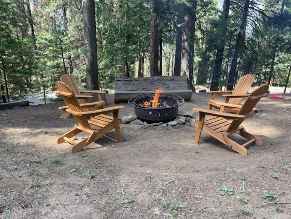 Outdoor firepit and sitting area.