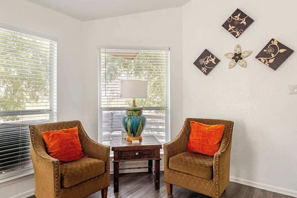 Additional cozy seating area with natural light and relaxing vibes. Perfect for morning coffee, reading, or planning your next Guadalupe River adventure.