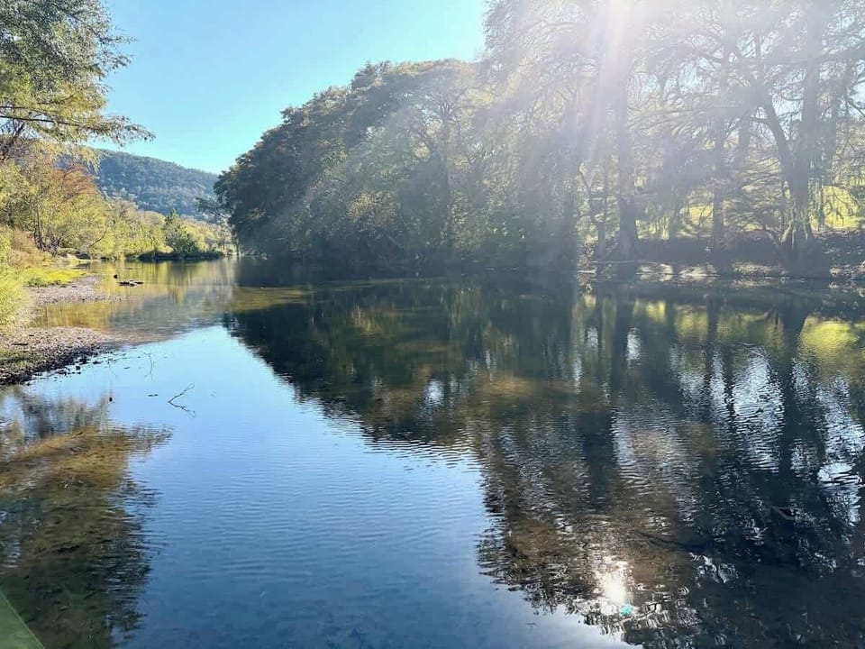 Wake up to calm Guadalupe River views surrounded by nature. A peaceful riverfront setting ideal for morning coffee, sunset watching, and unforgettable Hill Country memories.