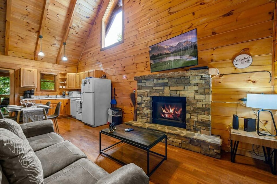 Cabin, 1 Queen Bed with Sofa bed, Hot Tub | Living area | 50-inch flat-screen TV with digital channels, TV, fireplace