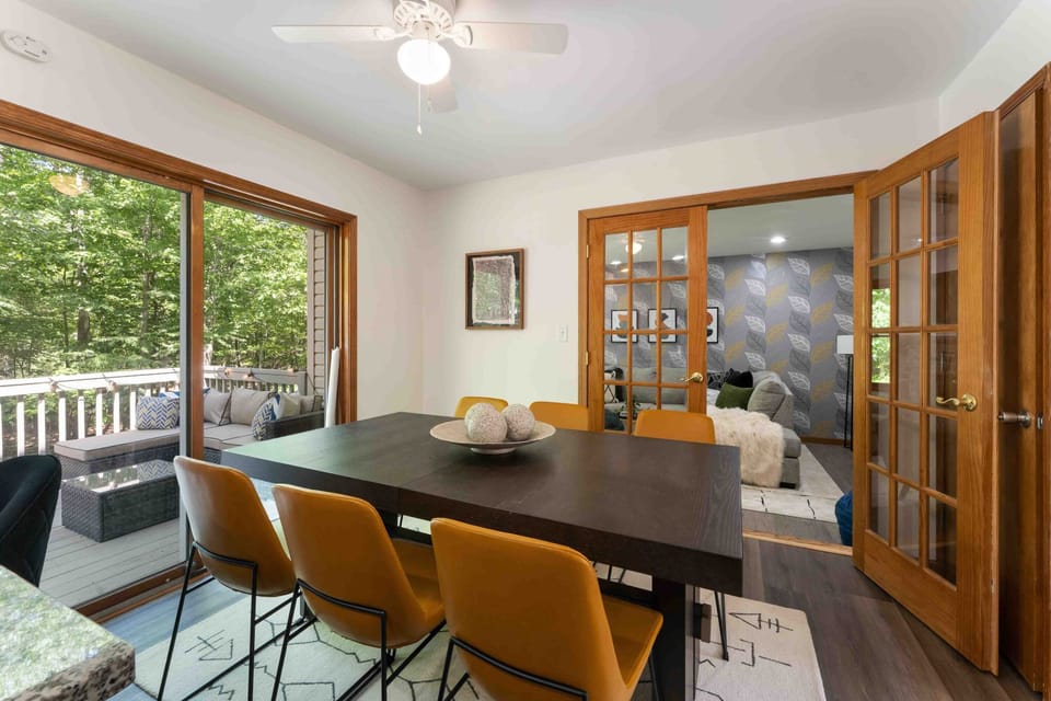 Large dining table perfect for family meals, board games, or holiday celebrations. - The Pasquin - East Stroudsburg, PA