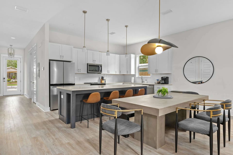 Whether cooking for a crowd or enjoying a quick meal, the fully equipped kitchen with a breakfast bar makes it easy and fun! - The Sandbar - Panama City Beach, FL