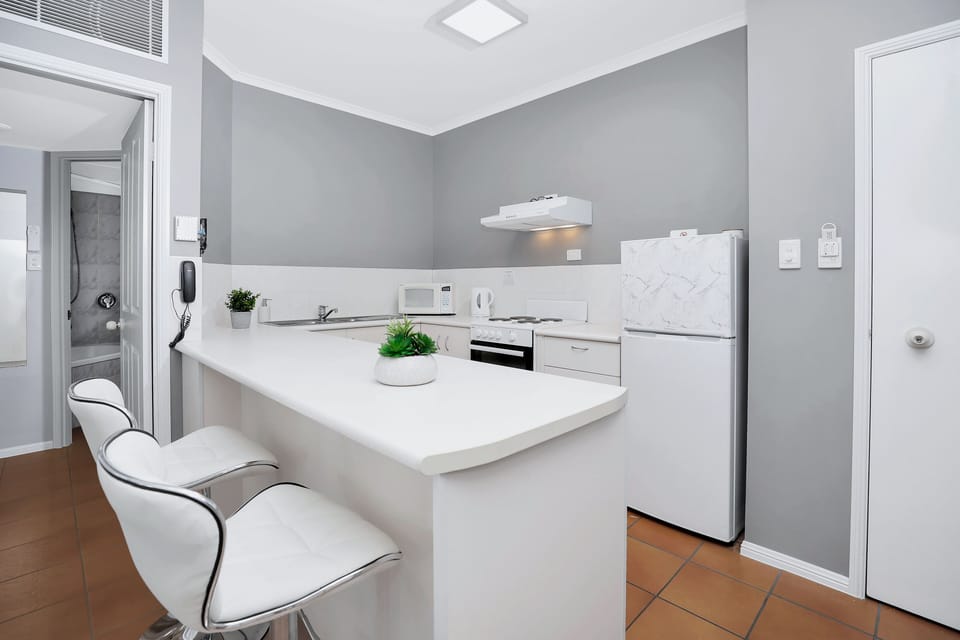 Comfort Apartment | Private kitchen | Full-size fridge, microwave, stovetop, dishwasher