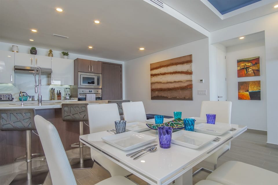 The dining table set near the kitchen counter