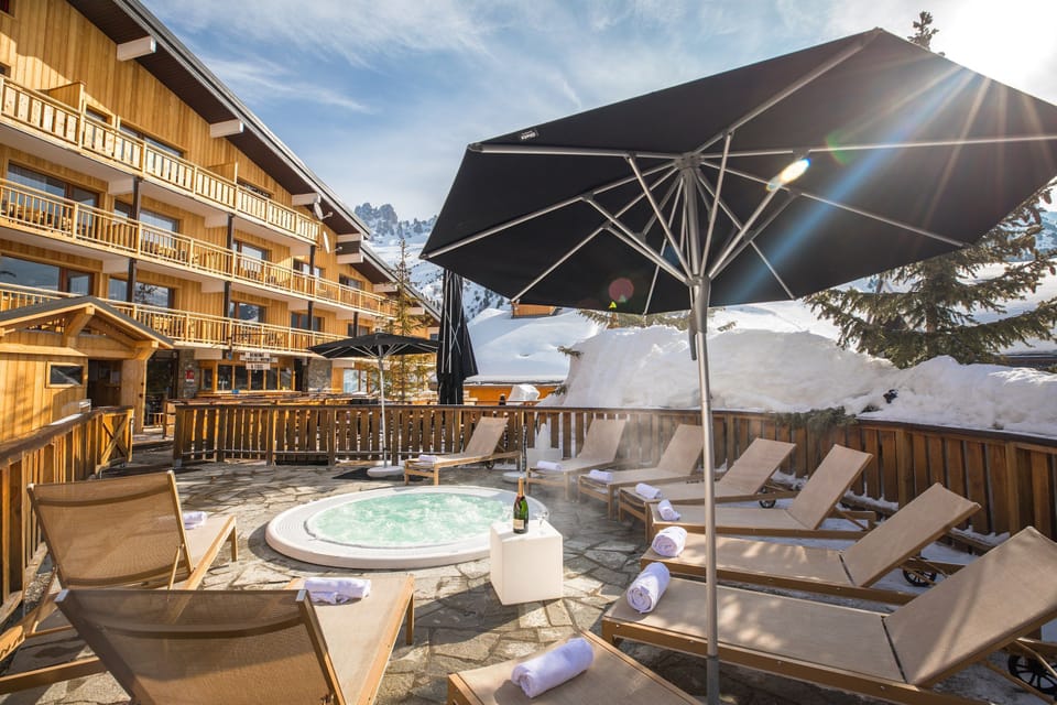 Take a dip in the shared outdoor hot tub!