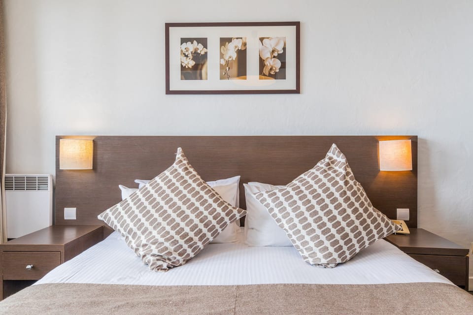 Fall asleep in our cozy bedroom.