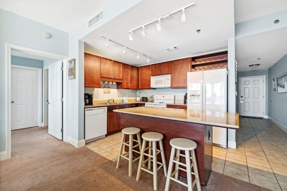 Fully Stocked Kitchen with Gulf Views and Island Bar Seating