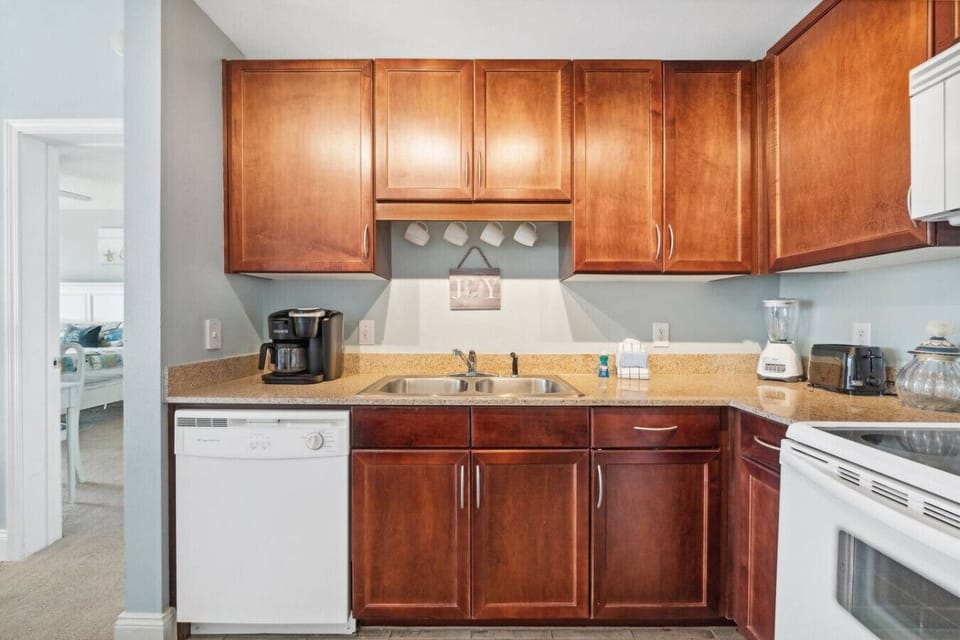 Fully Stocked Kitchen with Gulf Views and Island Bar Seating