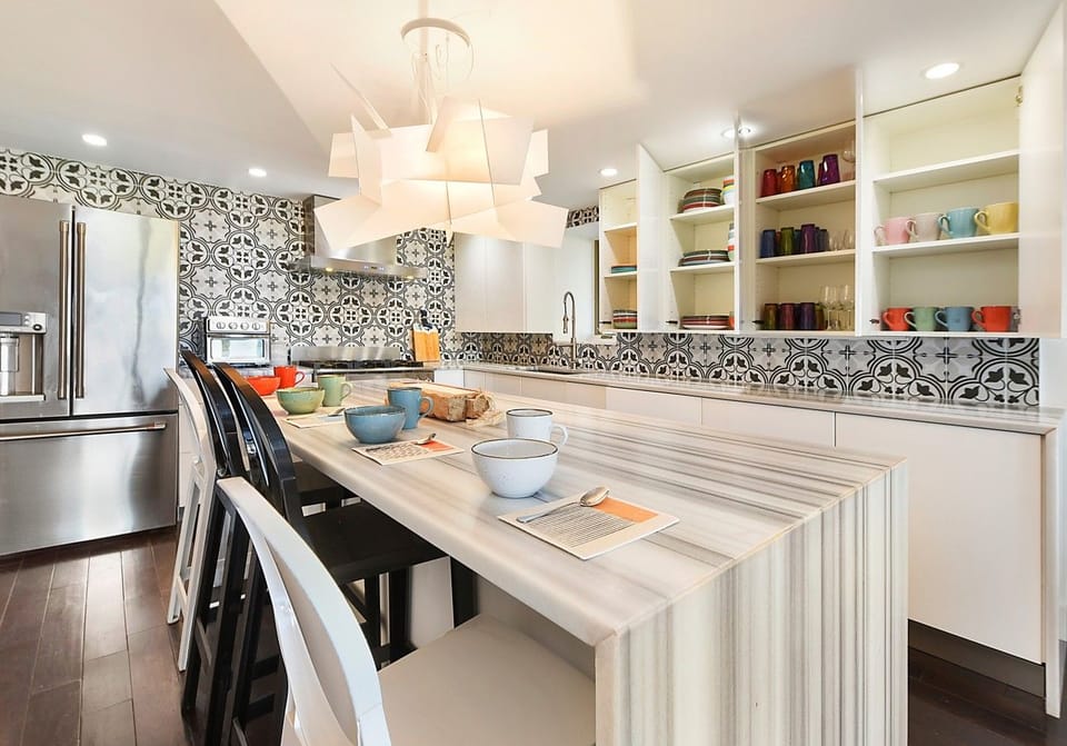 If the kitchen is too monochrome for you, just open any cabinet or drawer. Everything you need is here.