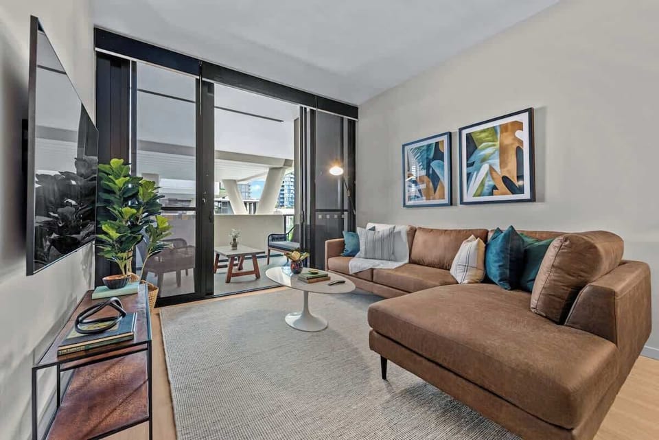 Beautiful leather chaise couch, 65' Smart TV, Private balcony...