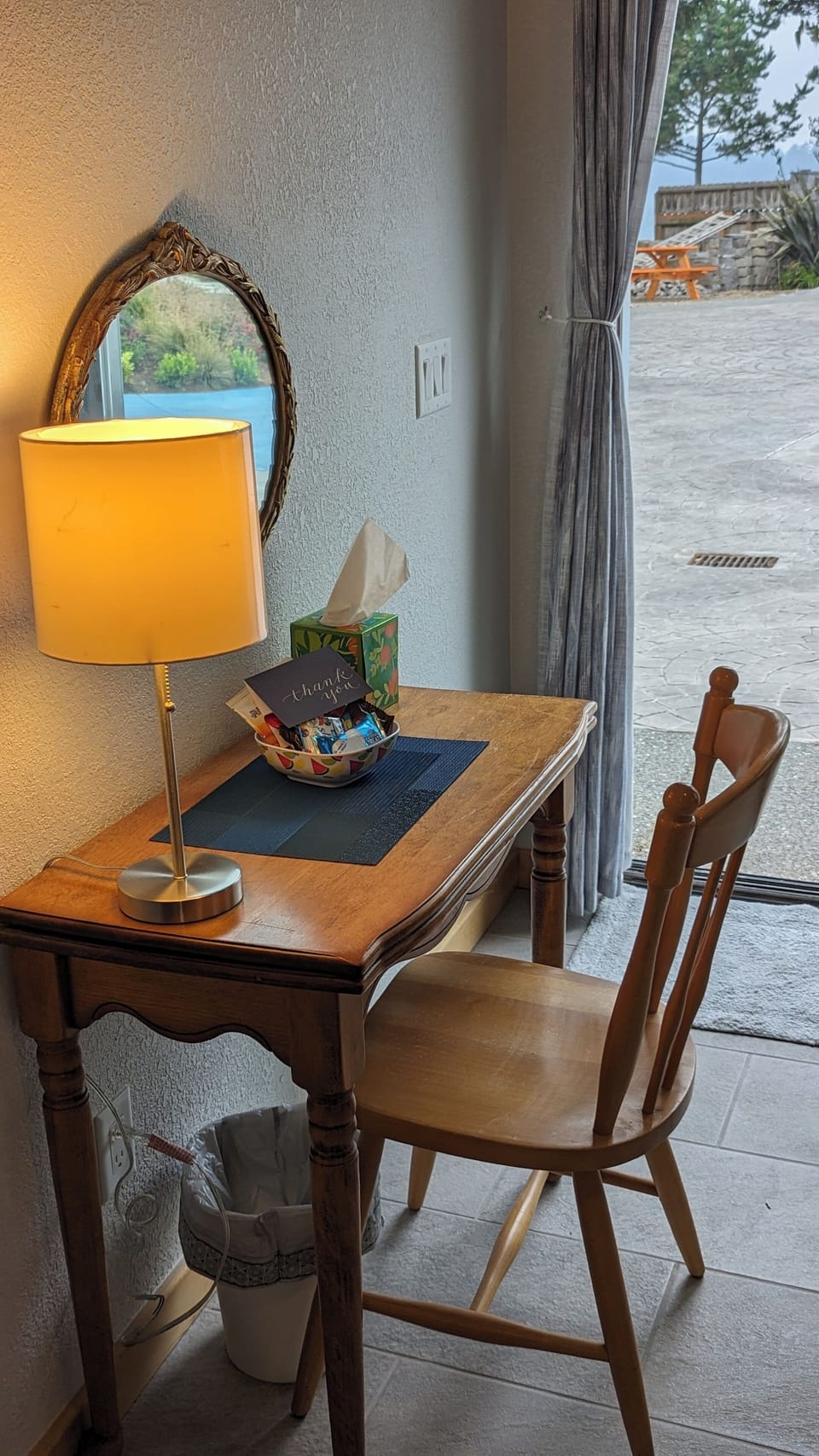 There's a desk for your use. It folds out to give you double the desktop area.