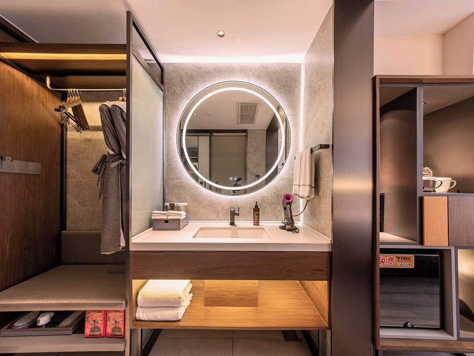 Down comforters, memory foam beds, minibar (free items), in-room safe