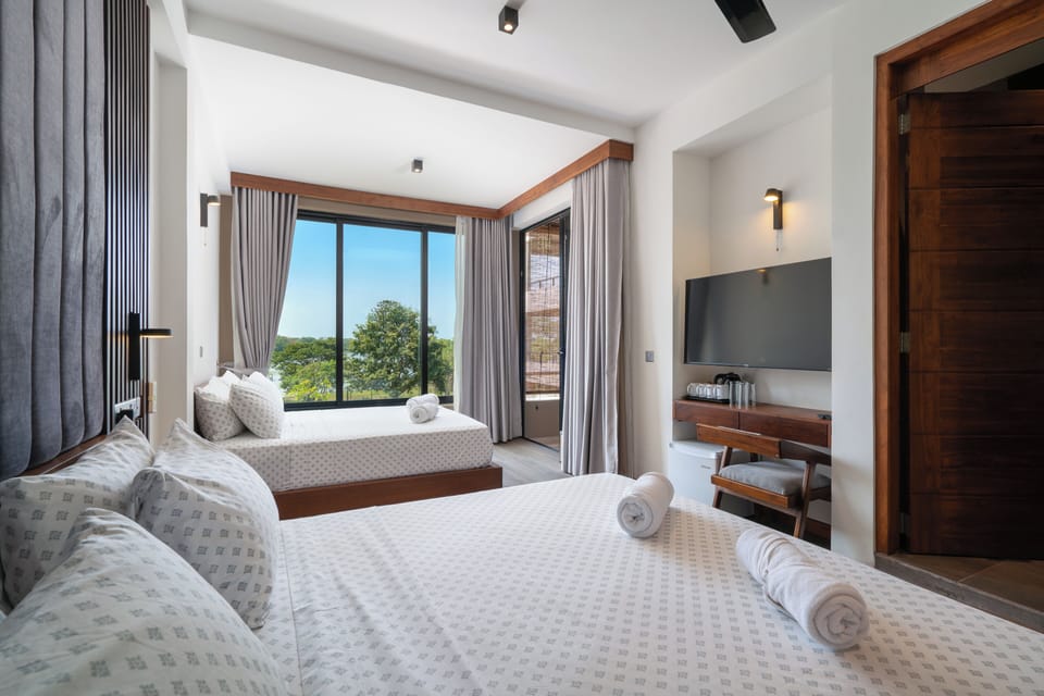 Family Room | Premium bedding, in-room safe, individually furnished, desk