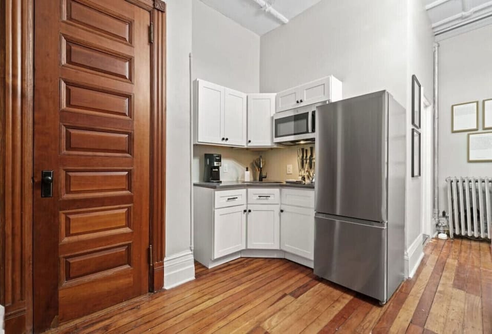 This kitchenette is equipped with essential appliances and cookware, providing everything you need to whip up tasty and uncomplicated meals during your stay.