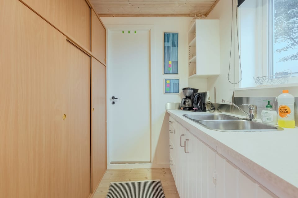 Studio, 1 Large Twin Bed | Private kitchen | Coffee/tea maker, full-size fridge, microwave, oven