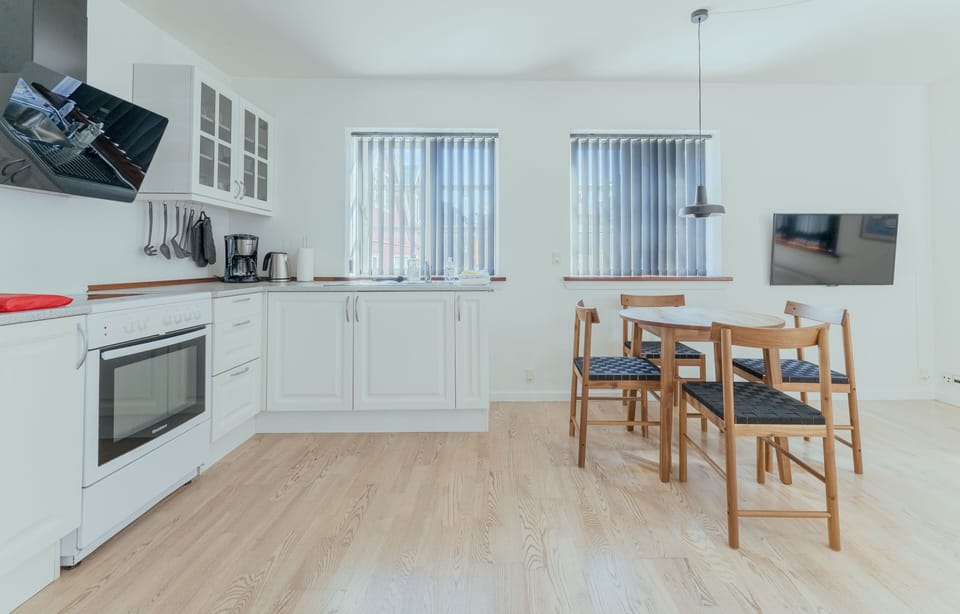 Apartment | Private kitchen | Coffee/tea maker, full-size fridge, microwave, oven