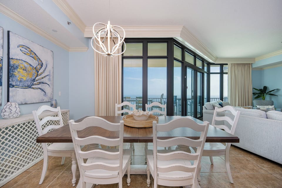 Gather your loved ones around the dining table, soaking in the beach vibes and stunning coastal views