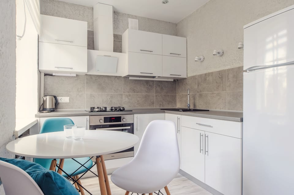 Comfort Apartment | Private kitchen | Full-size fridge, oven, stovetop, electric kettle