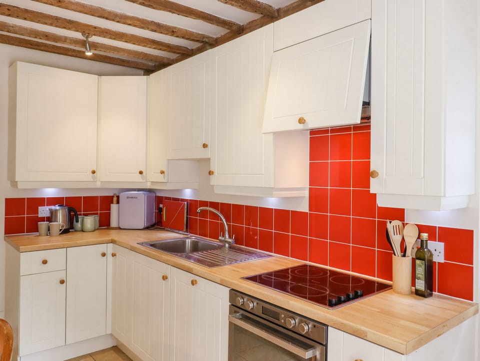 Fridge, dishwasher, electric kettle, cookware/dishes/utensils