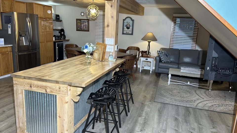 Enter into Large Eat-In Kitchen with lots of counter space & to Living Room Area