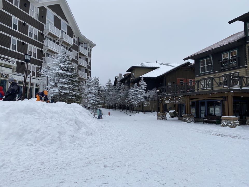 View from Snowshoe Mountain Village central towards Rimfire Lodge entrance