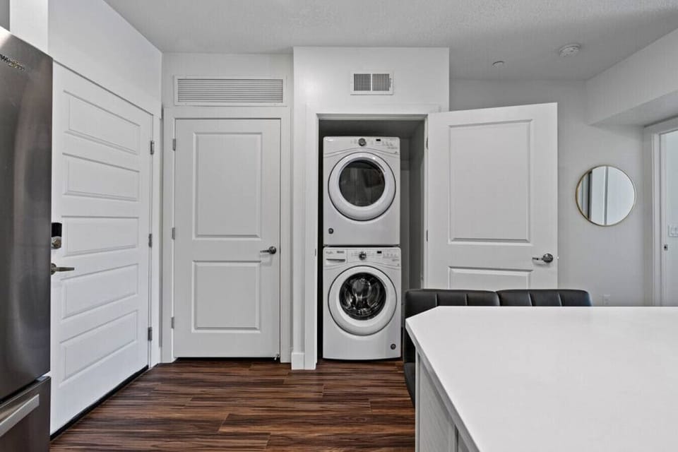 High efficiency washer and dryer (we supply you with laundry pods!)